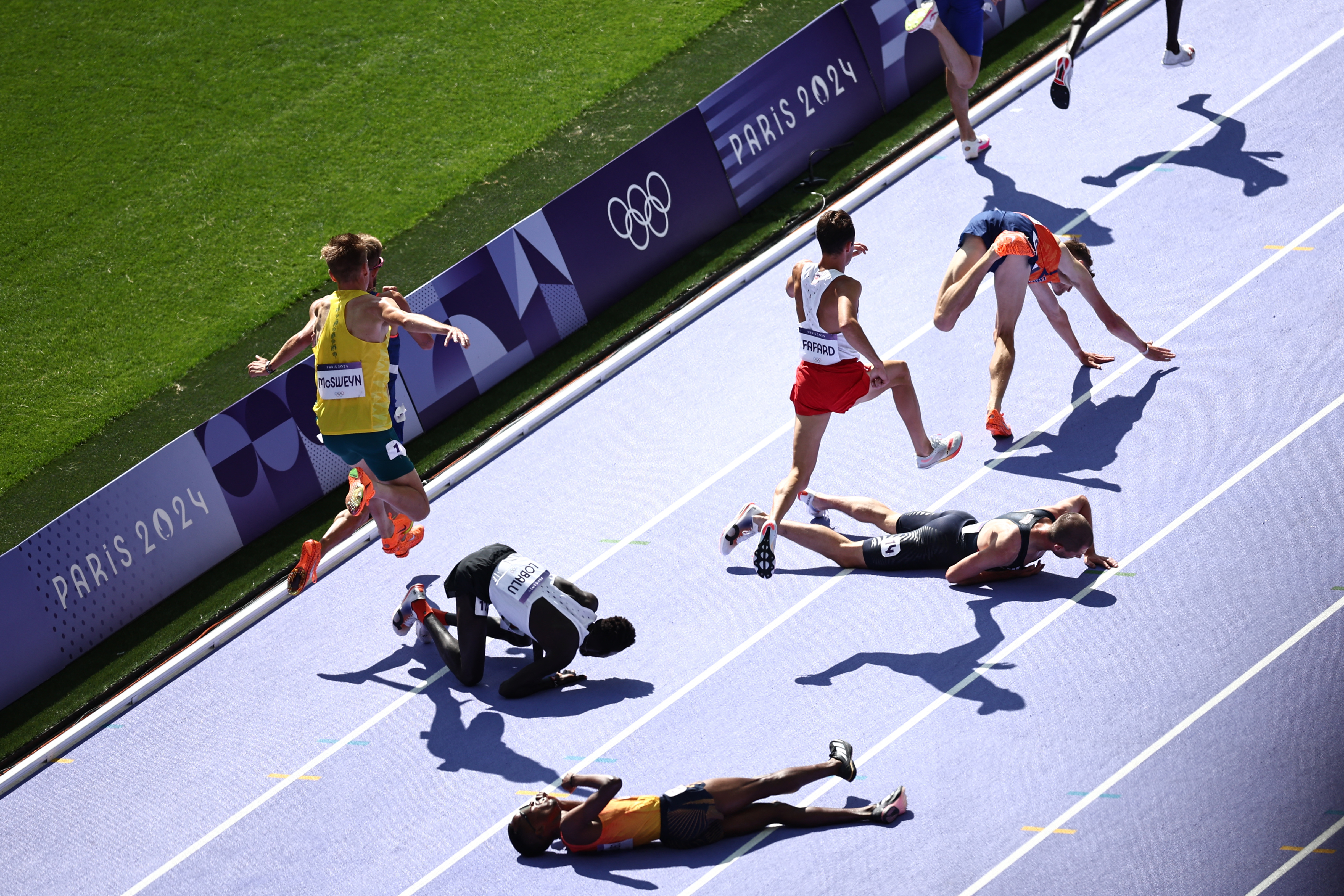 Crashes, cramps and accusations run rampant during heated Olympic track and field qualifying session