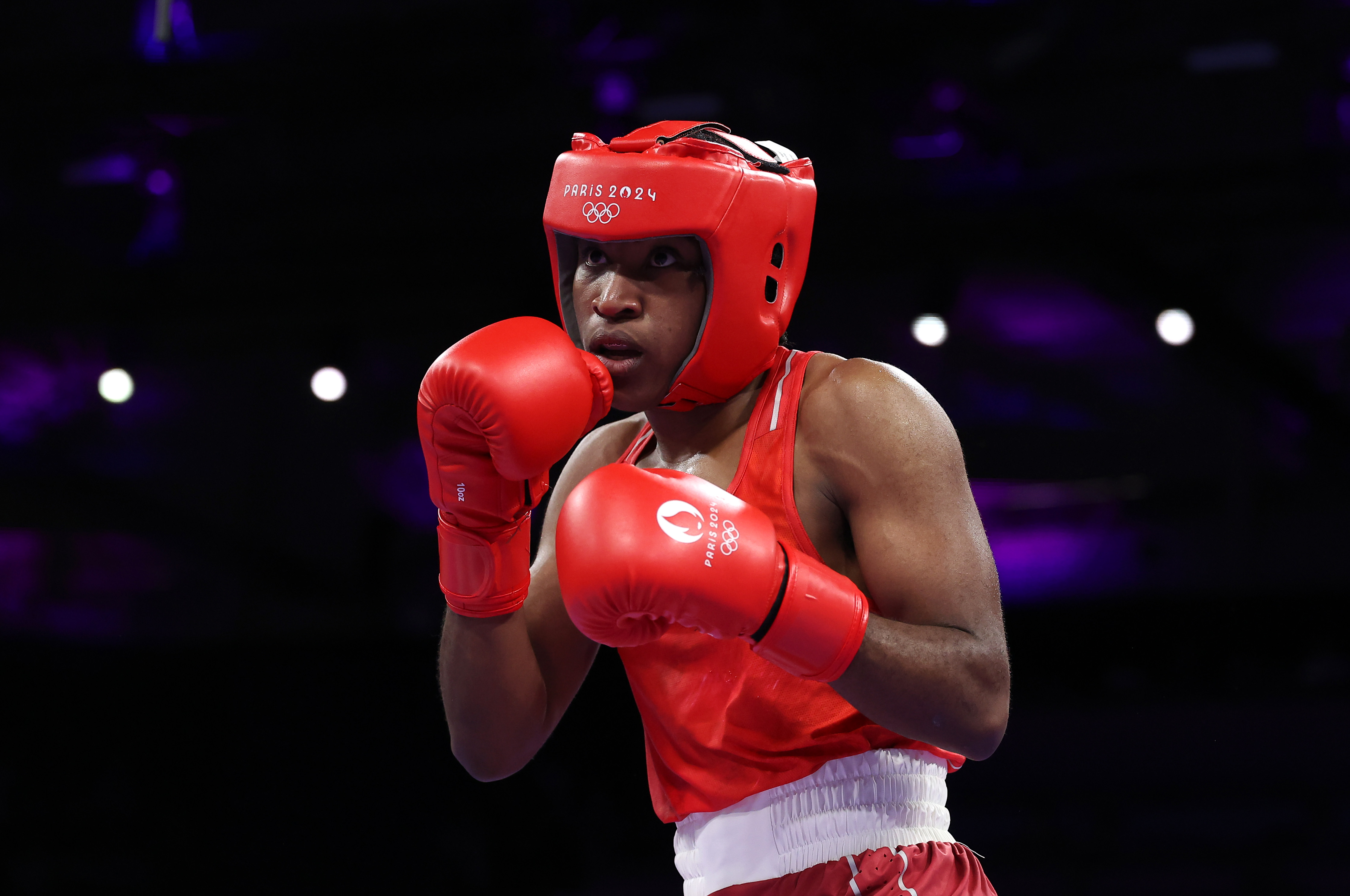 Cindy Ngamba makes history for refugees in the boxing ring with first-ever Olympic medal