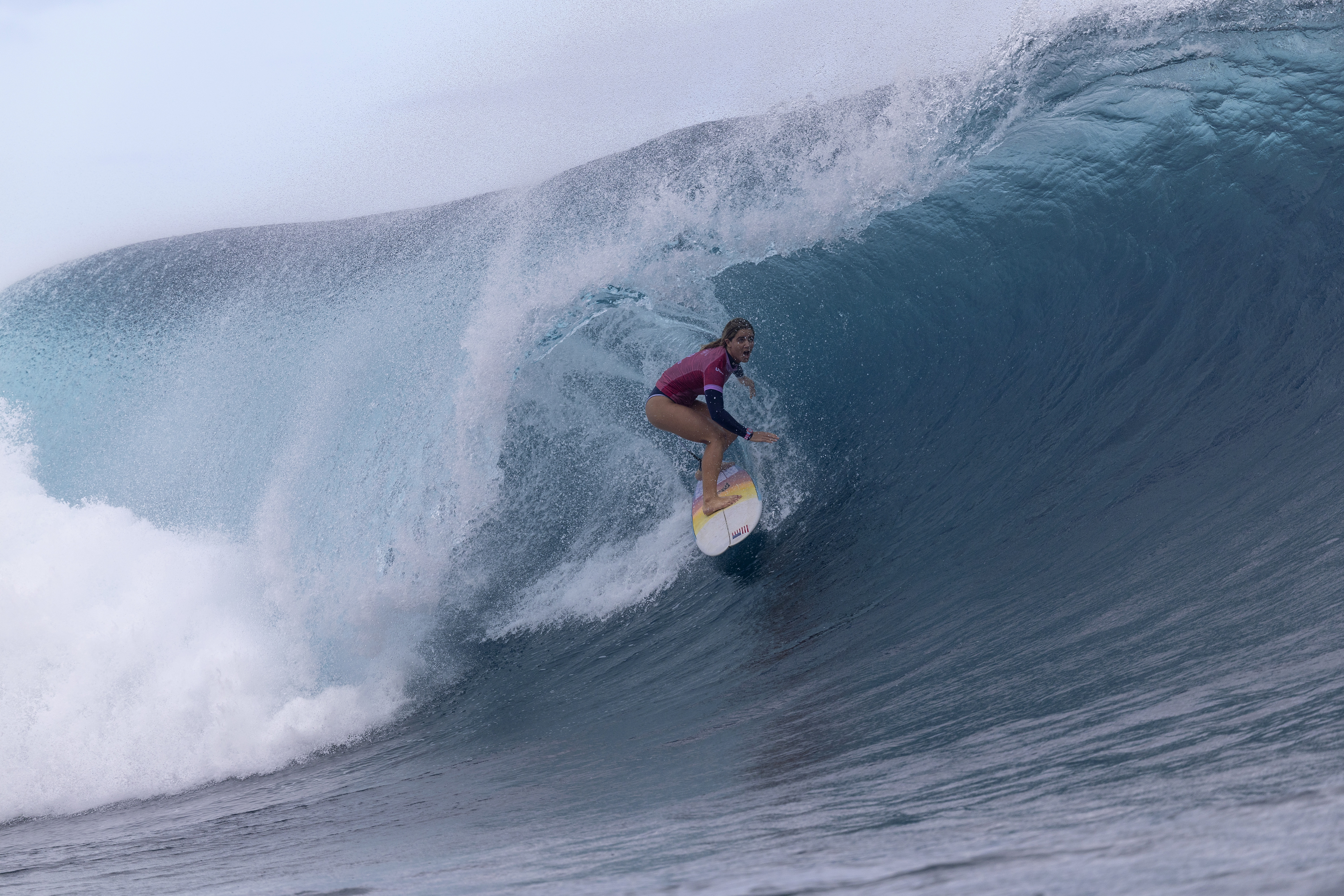 Team USA's Caroline Marks takes gold in women's surfing in the waters off Tahiti