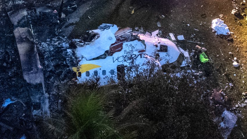 Aerial view of the wreckage of an airplane that crashed with 61 people on board in Vinhedo, Sao Paulo.