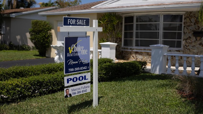 A ‘For Sale’ sign advertises a home for sale on April 20, 2023 in Cutler Bay, Florida.