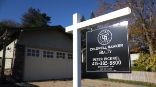 LARKSPUR, CALIFORNIA – NOVEMBER 30:  A sign is posted in front of a home for sale on November 30, 2023 in Larkspur, California. According to a report by the National Association of Realtors, pending home sales fell 1.5 percent in October to their lowest level in 20 years. (Photo by Justin Sullivan/Getty Images)