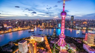 Night view of the Lujiazui financial district in downtown Shanghai.