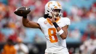 Nico Iamaleava #8 of the Tennessee Volunteers warms up prior to the Duke’s Mayo Classic against the NC State Wolfpack at Bank of America Stadium on September 07, 2024 in Charlotte, North Carolina. 