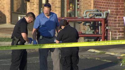 One person shot, one person in custody in shooting outside car wash in Woodbridge