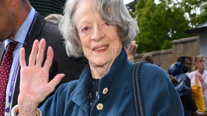 Maggie Smith waves