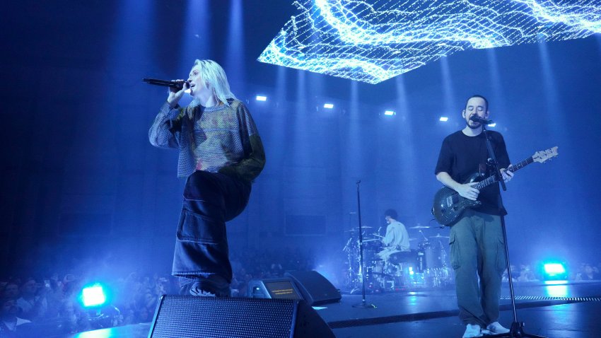 Emily Armstrong, from left, Colin Brittain, and Mike Shinoda of Linkin Park performs Thursday, Sept. 5, 2024, in Los Angeles. It was announced on Thursday that Dead Sara’s Emily Armstrong would join as the band’s new co-singer and songwriter/producer Colin Brittain would join on drums. Linkin Park will release the album “From Zero” on Nov. 15, marking their first new record since former frontman Chester Bennington died in 2017.