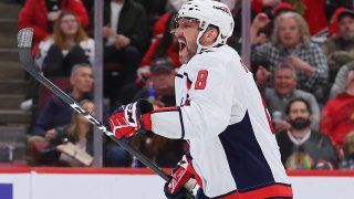 CHICAGO, ILLINOIS – DECEMBER 13: Alex Ovechkin #8 of the Washington Capitals celebrates after scoring his 800th career goal during the third period against the Chicago Blackhawks at United Center on December 13, 2022 in Chicago, Illinois. (Photo by Michael Reaves/Getty Images)