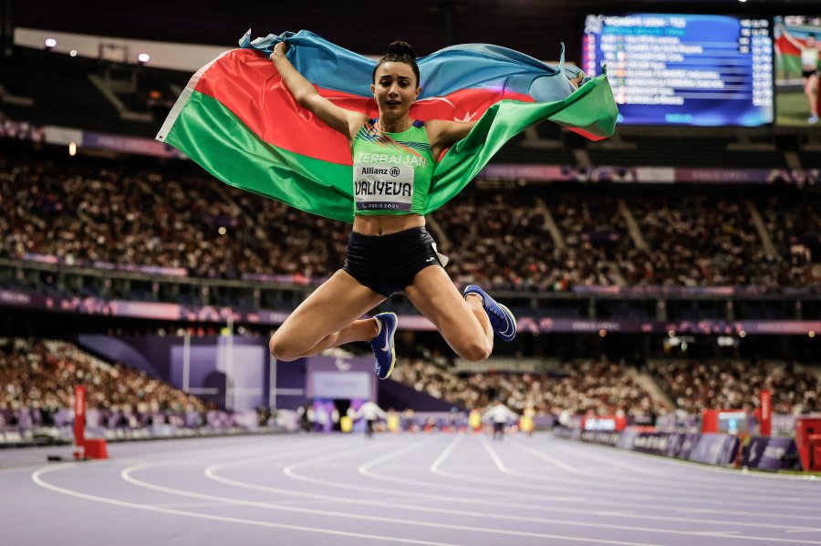 Gold medallist Azerbaijan's Lamiya Valiyeva reacts after winning the women's 100m T13 final during the Paris 2024 Paralympic Games at Stade de France in Saint-Denis France on September 3 2024