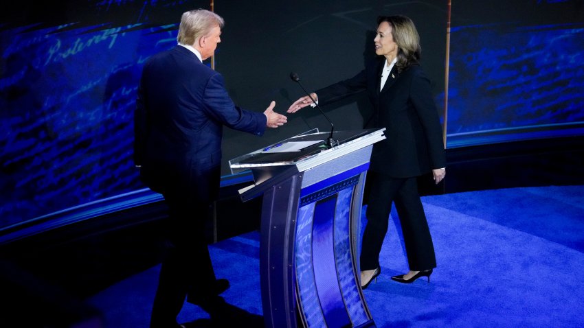 Vice President Kamala Harris and former President Donald Trump shake hands during the second presidential debate at the Pennsylvania Convention Center in Philadelphia, Pennsylvania, US, on Tuesday, Sept. 10, 2024.