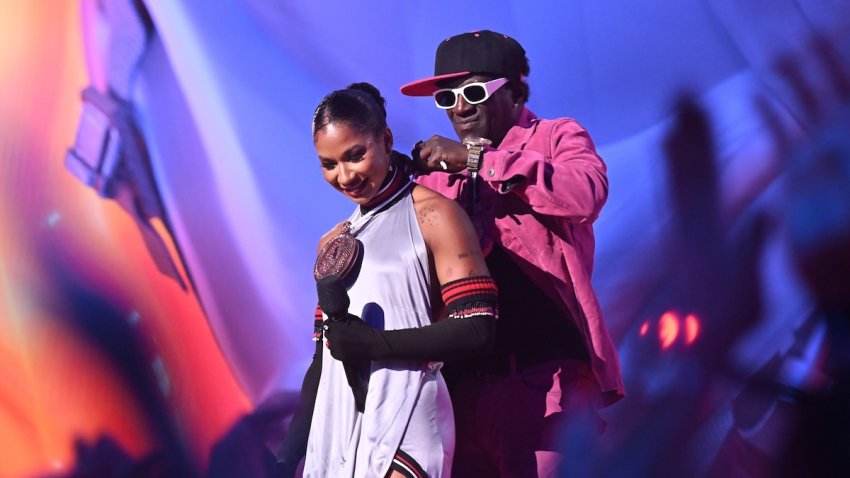 Jordan Chiles and Flavor Flav speak on stage during the 2024 MTV Video Music Awards at UBS Arena on September 11, 2024 in Elmont, New York.