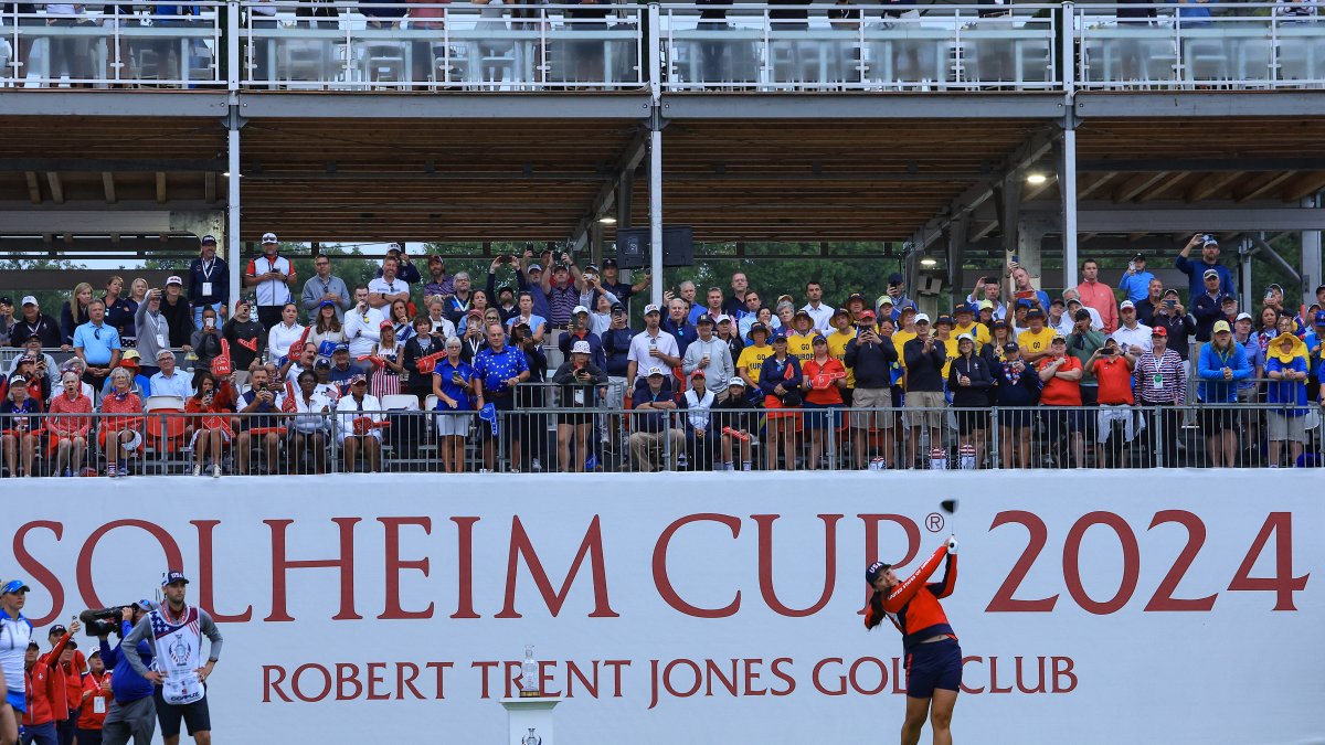 Fans wait for buses to the race track at the start of the Solheim Cup – NBC4 Washington