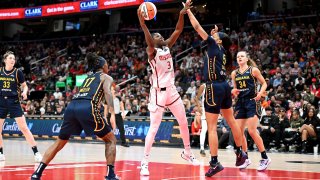 Sika Kone shoots in the fourth quarter against Victaria Saxton at Capital One Arena.