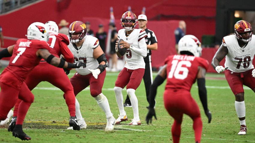 GLENDALE, ARIZONA – SEPTEMBER 29: Jayden Daniels #5 of the Washington Commanders looks to throw the ball against the Arizona Cardinals at State Farm Stadium on September 29, 2024 in Glendale, Arizona. (Photo by Norm Hall/Getty Images)