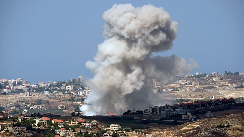 Smoke rises from Israeli shelling on villages in the Nabatiyeh district, seen from the southern town of Marjayoun, Lebanon, Monday, Sept. 23, 2024.