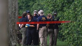 Law enforcement personnel continue to investigate the area around Trump International Golf Club after an apparent assassination attempt on former President Donald Trump on Sept. 16, 2024 in West Palm Beach, Florida.