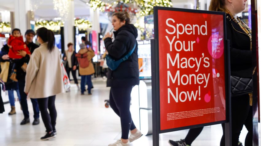 Customers visit the Macy’s Herald Square store in New York City on Dec. 17, 2023.