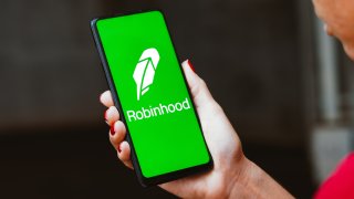 In this photo illustration, the Robinhood Markets, Inc. logo is displayed on a smartphone screen.