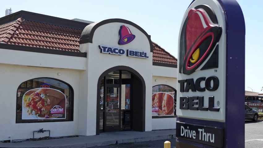 A sign is posted in front of a Taco Bell restaurant on May 01, 2024 in Richmond, California. 