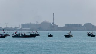 Basij paramilitary force speed boats are sailing along the Persian Gulf near the Bushehr nuclear power plant during the IRGC marine parade commemorating the Persian Gulf National Day in the south of Iran, on April 29, 2024.