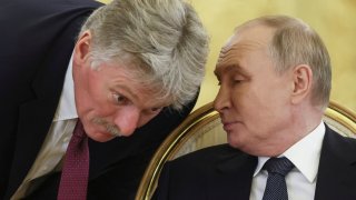 Russian President Vladimir Putin speaks with Kremlin spokesman Dmitry Peskov during a summit of leaders of nations, which are members of the Commonwealth of Independent States (CIS), in Moscow, Russia October 8, 2024. 