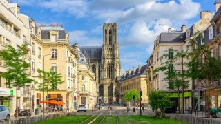 Travelers are looking past major cities to places like Reims, France, according to Expedia.