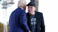 Tesla and SpaceX CEO Elon Musk speaks with former president Donald Trump during a campaign event at the Butler Farm Show, Saturday, Oct. 5, 2024, in Butler, Pa. 