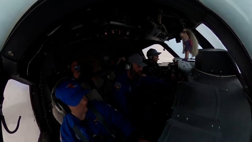 NOAA scientists in an airplane