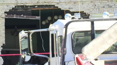 Flatbed truck driver crashes into Fairfax home, leaving gaping hole in living room