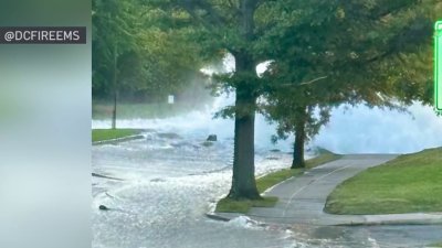 Man rescued after water main break on Michigan Ave NW