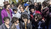 Contestants gather for the Timothee Chalamet lookalike contest in Washington Square Park, Sunday, Oct. 27, 2024, in New York. (AP Photo/Stefan Jeremiah)