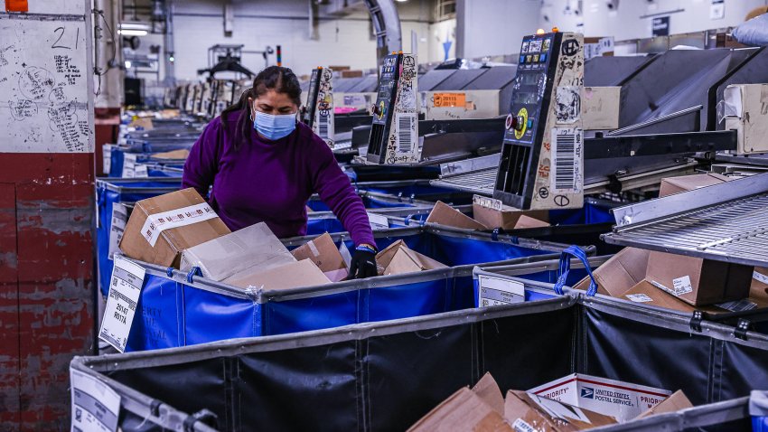 Postal worker with packages