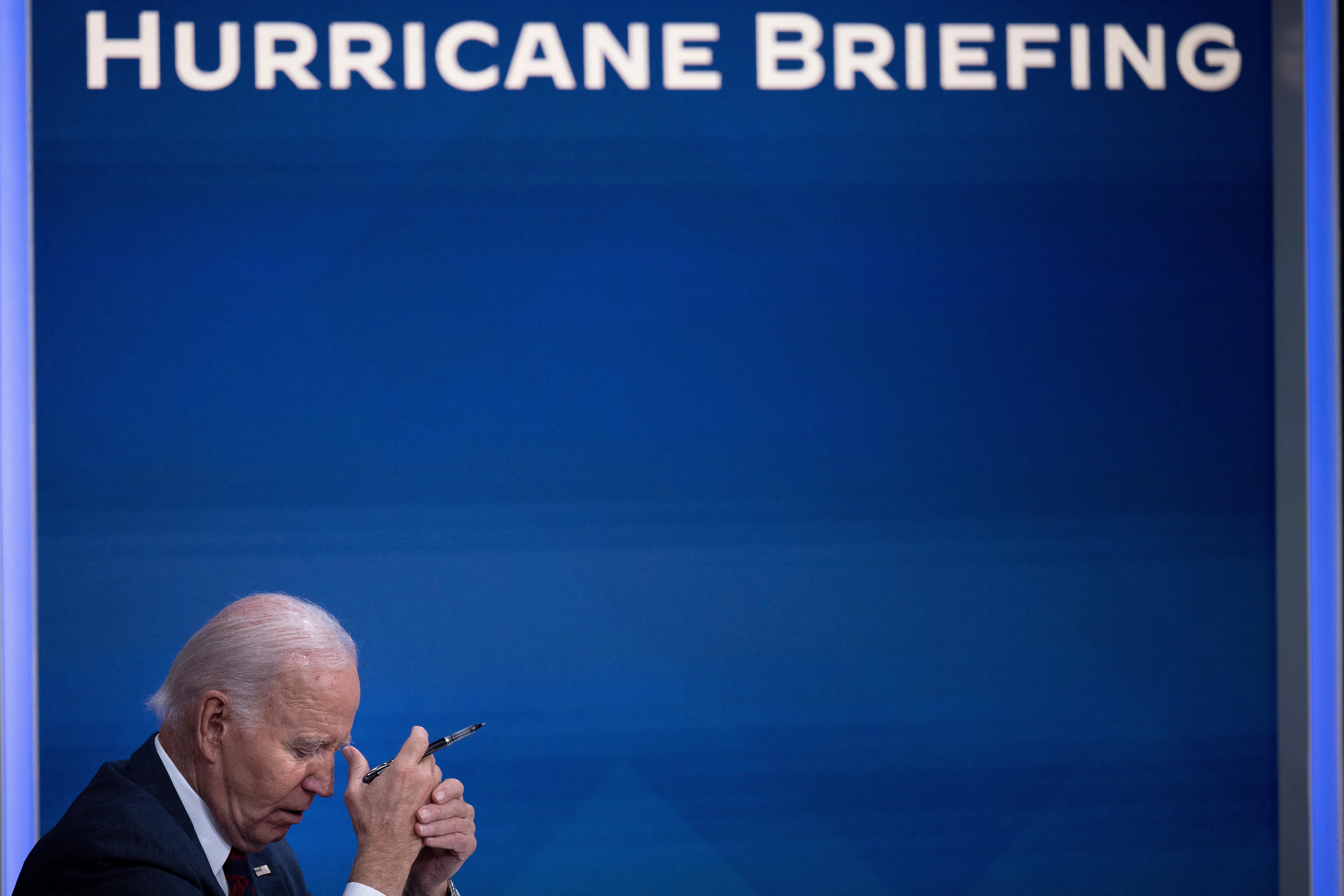 President Joe Biden listens during a briefing about Hurricane Milton in the Eisenhower Executive Office Building October 9, 2024 in Washington, DC.