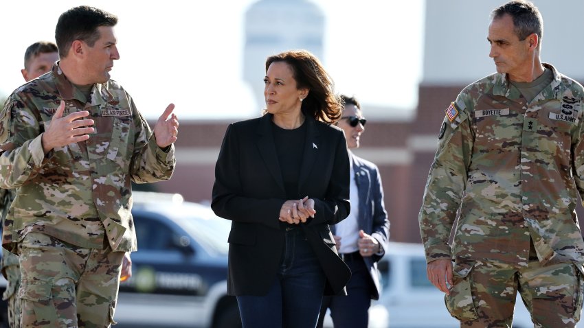 Kamala Harris talks to U.S. Armed Forces members