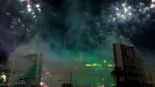 LAS VEGAS, NEVADA - OCTOBER 09: A 555-drone and fireworks display by Fireworks by Grucci precedes the implosion of the 23-story Paradise (L) and Club hotel towers of the Tropicana Las Vegas on October 09, 2024 in Las Vegas, Nevada. The hotel-casino opened in 1957 and closed permanently in April 2024 to make way for a planned USD 1.5 billion, 33,000-seat domed stadium for Major League Baseball's Oakland Athletics and a related resort development by Bally's Corp. and Gaming and Leisure Properties Inc. MLB owners approved the team's relocation to Nevada in November 2023, and the A's hope to move into the ballpark, which will occupy nine acres of the 35-acre site, in 2028. (Photo by Ethan Miller/Getty Images)