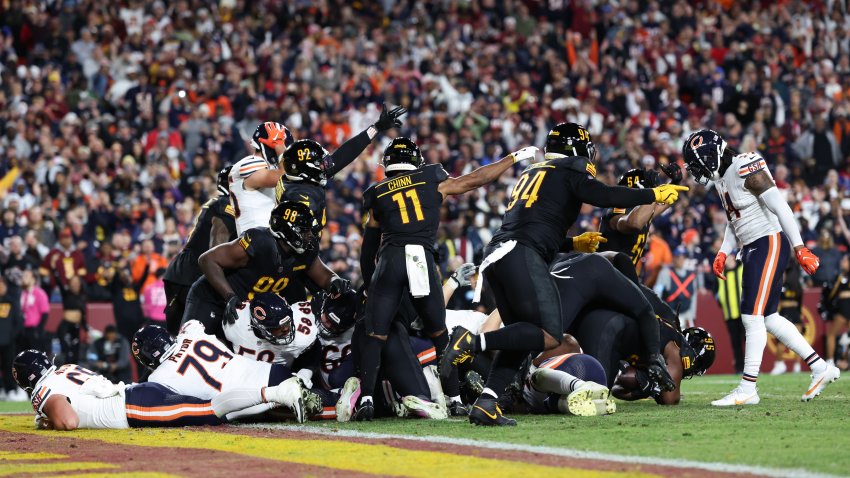 LANDOVER, MARYLAND – OCTOBER 27: Phidarian Mathis #98, Dorance Armstrong #92, Jeremy Chinn #11,Daron Payne #94, and Bobby Wagner #54 of the Washington Commanders celebrate after recovering a fumble in the fourth quarter of a game against the Chicago Bears at Northwest Stadium on October 27, 2024 in Landover, Maryland. (Photo by Scott Taetsch/Getty Images)