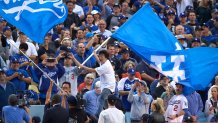 Baseball: World Series: Actor, comedian and Los Angeles Dodgers fan Ken Jeong waving flag on top of dugout before game vs Houston Astros at Dodger Stadium. Game 7. 
Los Angeles, CA 11/1/2017
CREDIT: John W. McDonough (Photo by John W. McDonough /Sports Illustrated via Getty Images)
(Set Number: X161490 TK7 )