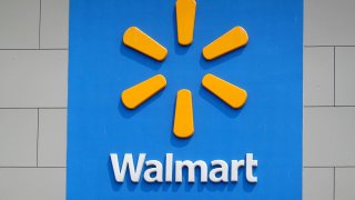 Customers shop at a Walmart store on May 18, 2023 in Chicago, Illinois.