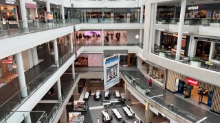 Shoppers walk through the Fashion Centre at Pentagon City, a shopping mall in Arlington, Virginia, February 2, 2024.