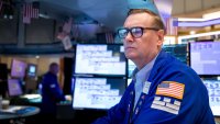 Traders work on the floor of the New York Stock Exchange. 