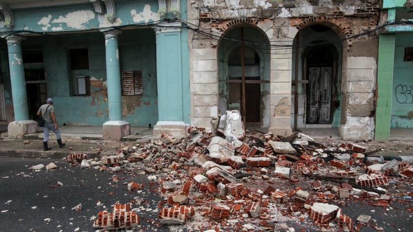 Debris from a building damaged by the passage of Hurricane Rafael