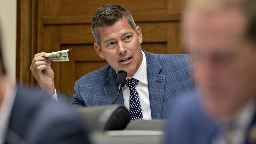 Representative Sean Duffy, a Republican from Wisconsin, holds a $20 dollar bill while questioning David Marcus, head of blockchain with Facebook Inc., not pictured, during a House Financial Services Committee hearing in Washington, D.C., U.S., on Wednesday, July 17, 2019. Republican and Democratic Senators sharply questioned Facebook Inc.'s plan to create its own digital money, adding to a chorus of skepticism across Washington and underscoring the challenges the company faces in getting its cryptocurrency off the ground.