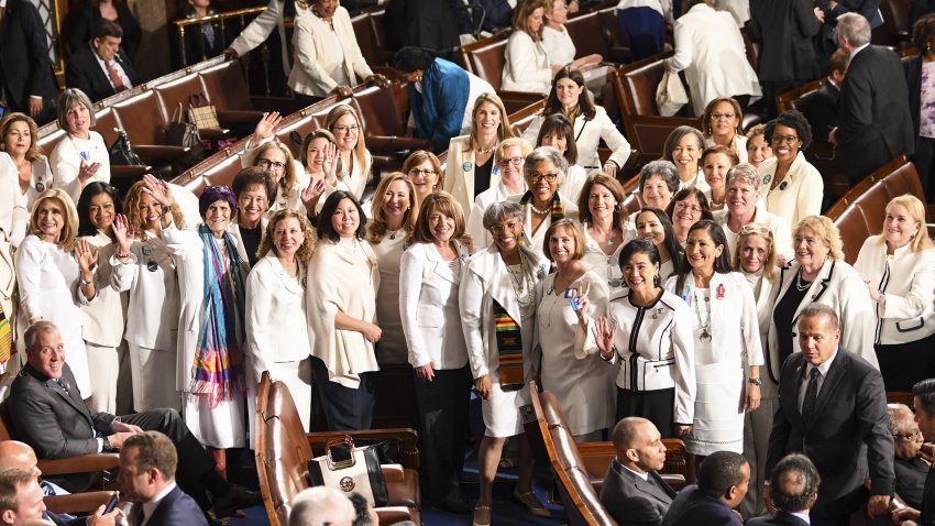 Female lawmakers in solidarity with women and a nod to the suffragette movement ahead of then-President Donald Trump's State of the Union address at the Capitol in February 2020.