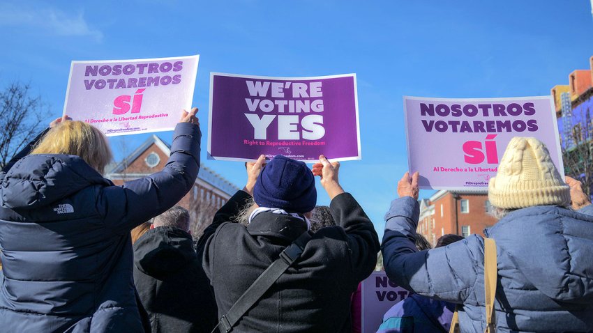 Supporters hold posters advocating for reproductive freedom during a rally launching FIRM (Freedom in Reproduction Maryland), a group campaigning in support of the constitutional amendment to protect abortion rights in Maryland. (Karl Merton Ferron/The Baltimore Sun/Tribune News Service via Getty Images)