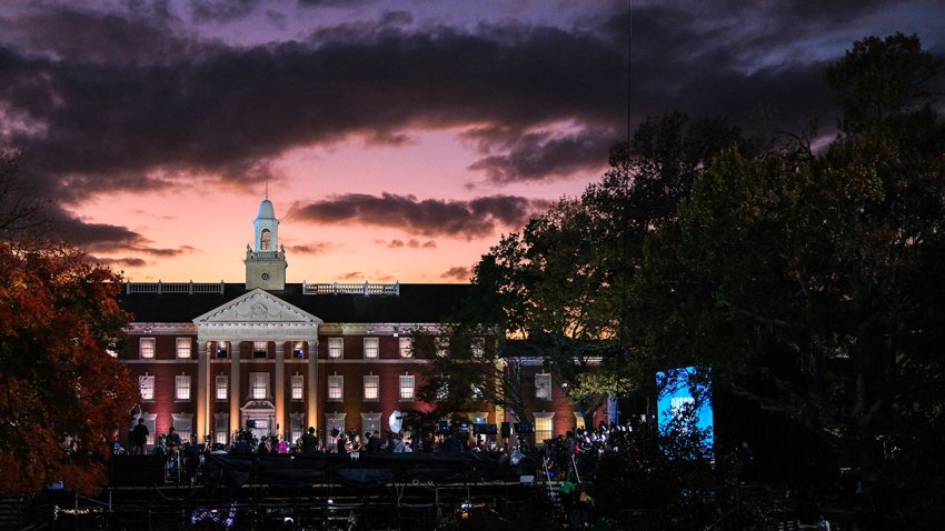 Members of the media report from Howard University ahead of an election night event for Vice President Kamala Harris.