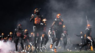 Alexandria, VA – October 25 – Hayfield runs onto the field Friday, Oct. 25, 2024, ahead of the the first half as No. 3 Riverdale Baptist takes on No. 4 Hayfield at Hayfield High School in Alexandria, Va. (Photo by Luke Johnson for The Washington Post via Getty Images)