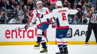 SALT LAKE CITY, UTAH – NOVEMBER 18: Alex Ovechkin #8 of the Washington Capitals celebrates his goal with Jakob Chychrun #6 of the Washington Capitals during the first period against the Utah Hockey Club on November 18, 2024 at Delta Center in Salt Lake City, Utah.  (Photo by Hunter Dyke/NHLI via Getty Images)