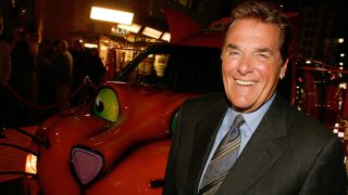 FILE - Game show host Chuck Woolery