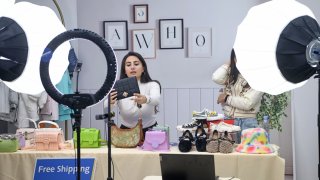 A file photo of a livestreamer selling handbags at a TikTok Livestreaming E-commerce Base on October 12, 2021 in Wuhan, China.