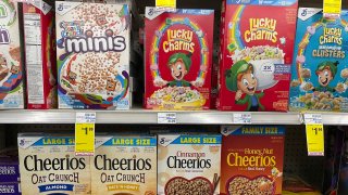 Boxes of General Mills cereal are displayed on a grocery store shelf on December 20, 2023 in San Anselmo, California.